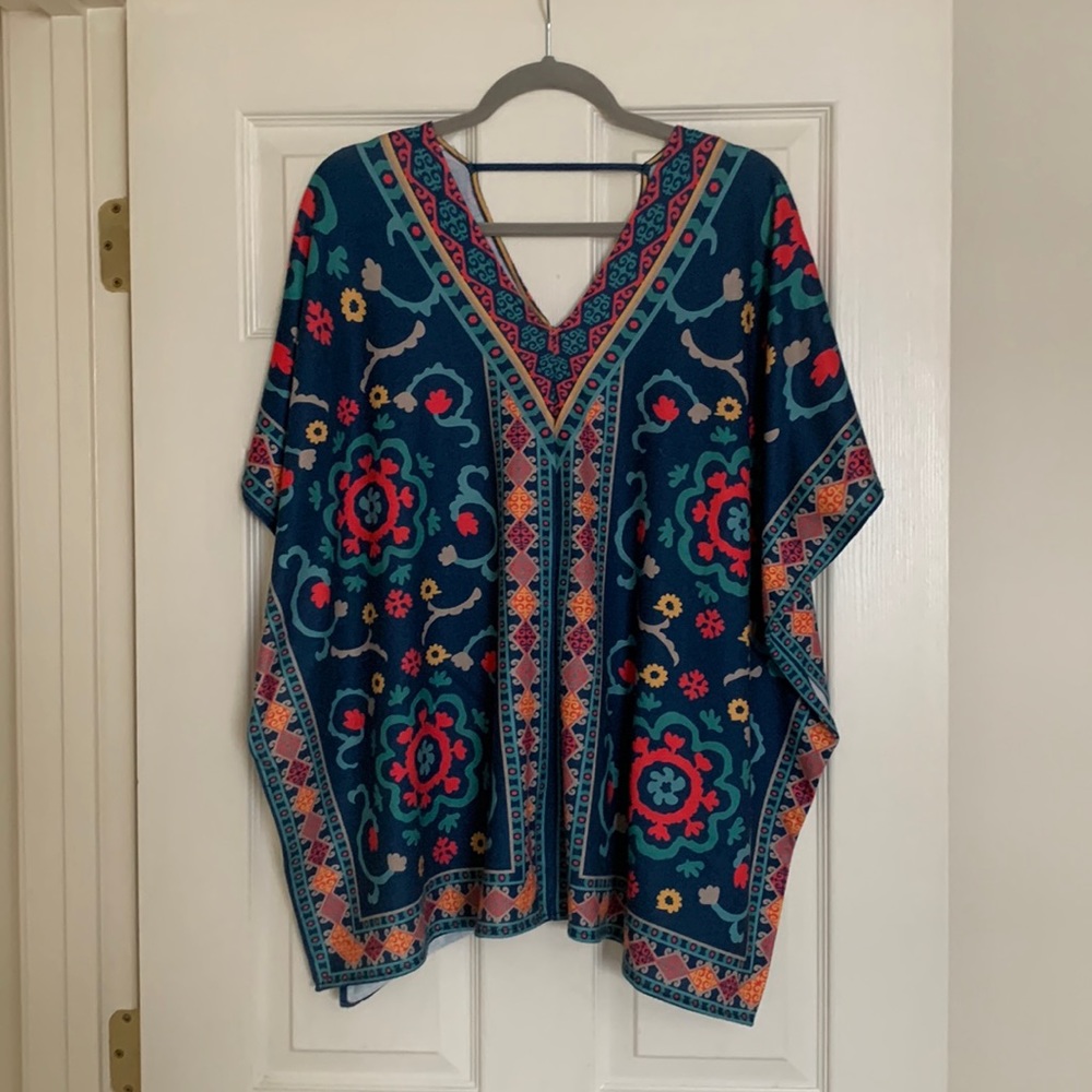 Flying Tomato poncho, size s/m